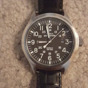 Timex watch with Indiglo in good condition; new leather band.